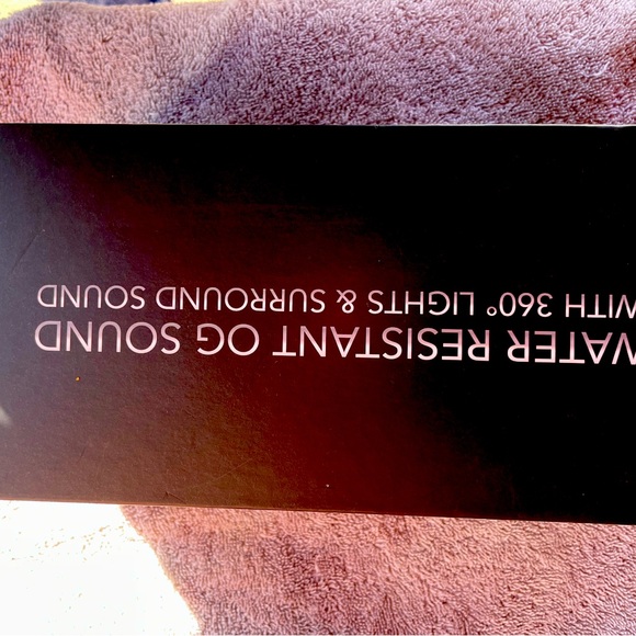 Water resistant bluetooth speaker, lights and surround sound, brand new . - Picture 4 of 4